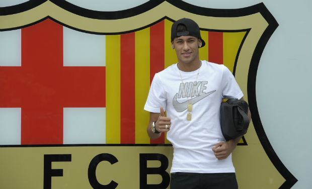 In this June 3, 2013 file photo, FC Barcelona's then new signing Neymar gestures upon his arrival at the club's office at the Camp Nou stadium in Barcelona, Spain - AP In this June 3, 2013 file photo, FC Barcelona's then new signing Neymar gestures upon his arrival at the club's office at the Camp Nou stadium in Barcelona, Spain - AP